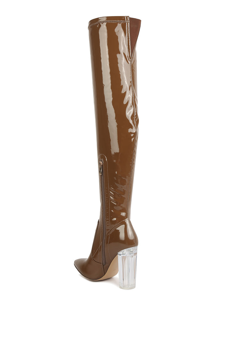 Noire Thigh High Long Boots in Patent PU with clear block heels, showcasing a sleek and glossy finish, perfect for winter fashion.