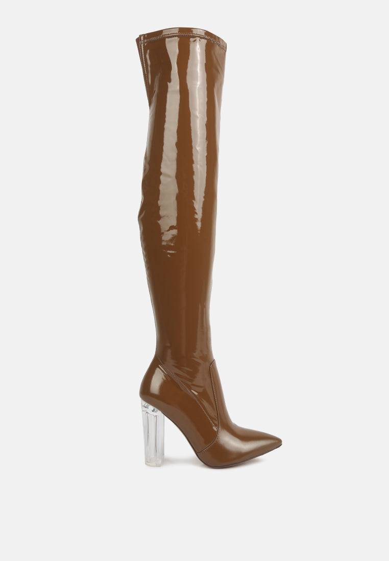 Noire Thigh High Long Boots in Patent PU with clear block heels, showcasing a sleek and glossy finish, perfect for winter fashion.