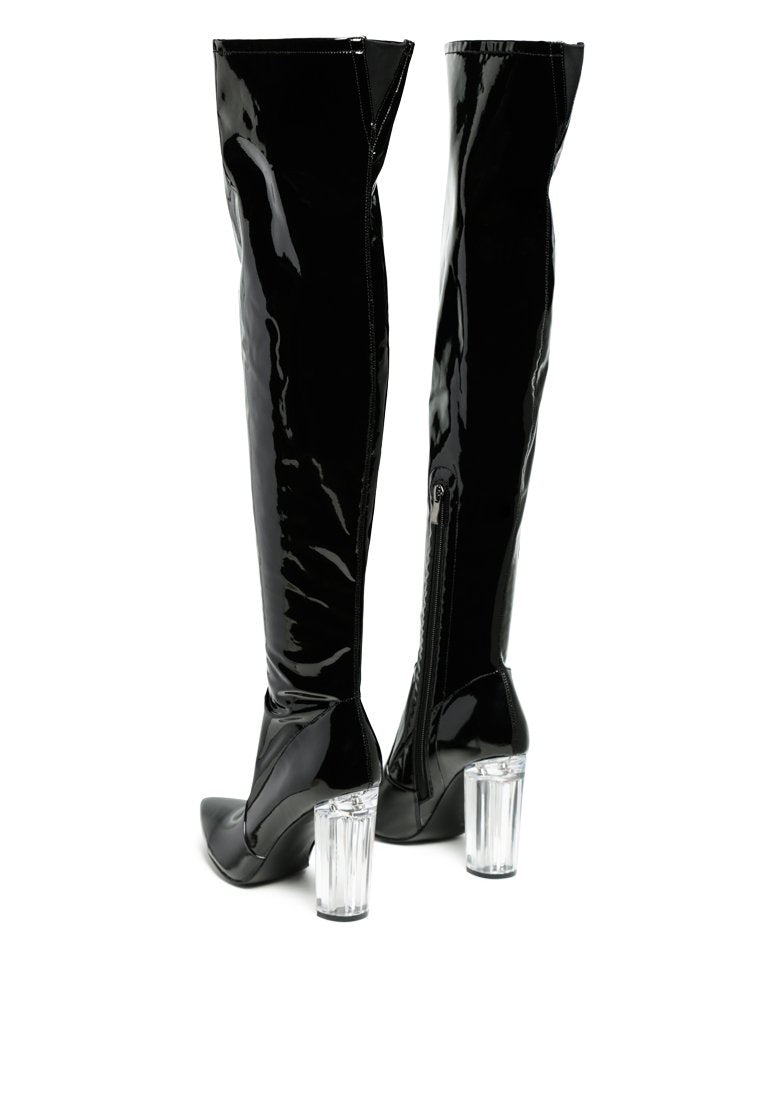 Noire Thigh High Long Boots in Patent PU with clear block heels, showcasing a sleek and glossy finish, perfect for winter fashion.