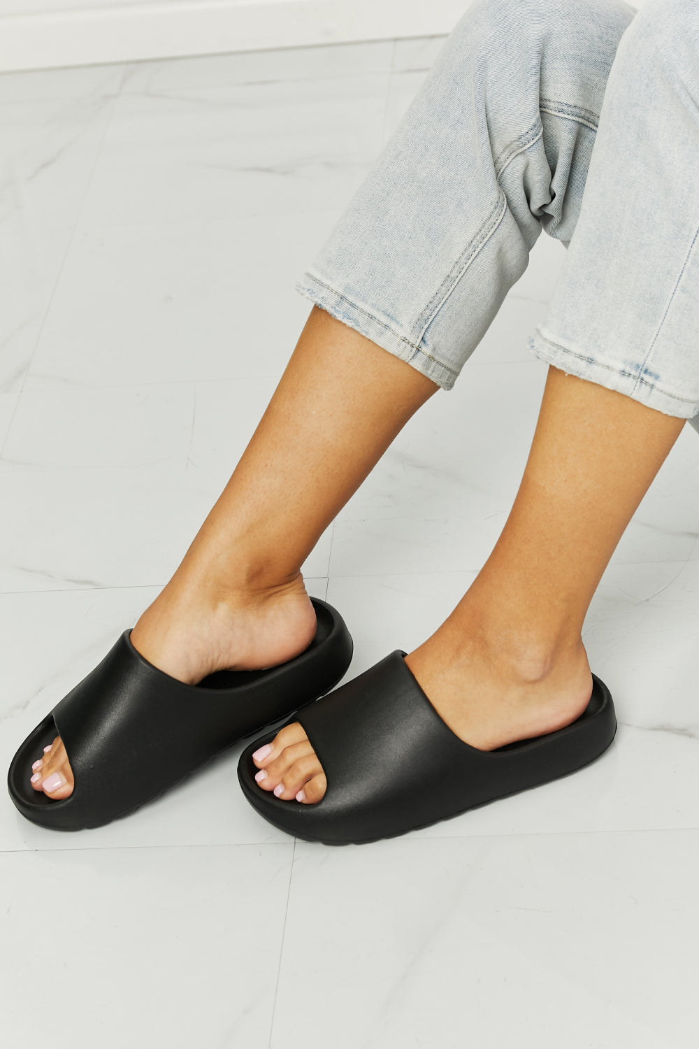 NOOK JOI In My Comfort Zone Slides in Black with durable rubber sole and open toe design, perfect for casual wear.