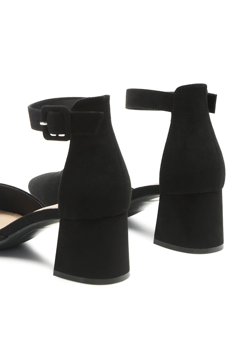 Nymph Faux Leather Low Block Heel Sandals featuring a pointed toe and ankle strap design, perfect for casual and work settings.