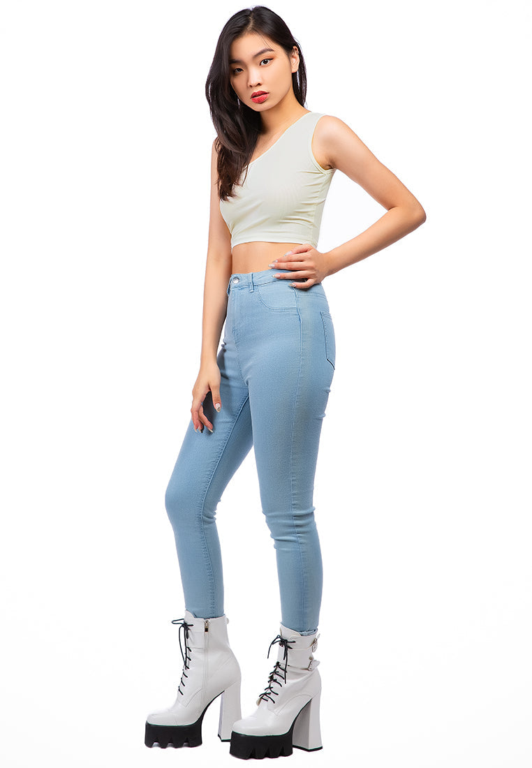 One Shoulder Knitted Crop Top in various colors, showcasing its trendy design and breathable cotton fabric.