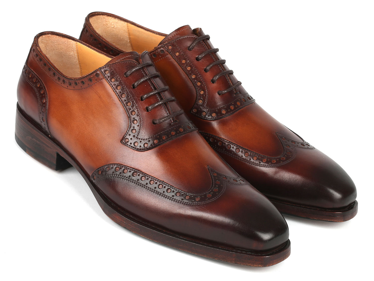 Paul Parkman Goodyear Welted Men's Wingtip Oxfords in brown leather, showcasing intricate craftsmanship and elegant design.