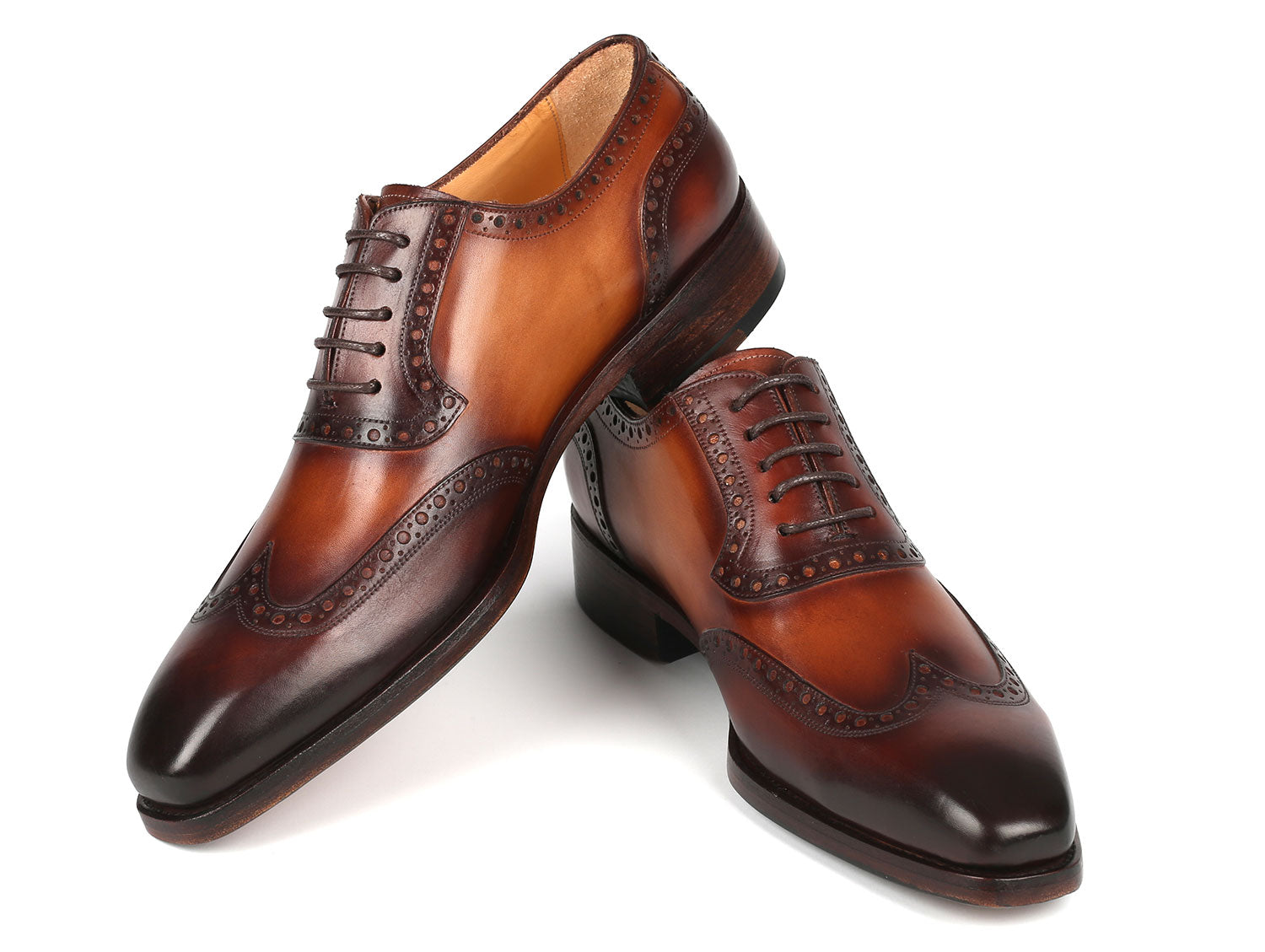 Paul Parkman Goodyear Welted Men's Wingtip Oxfords in brown leather, showcasing intricate craftsmanship and elegant design.