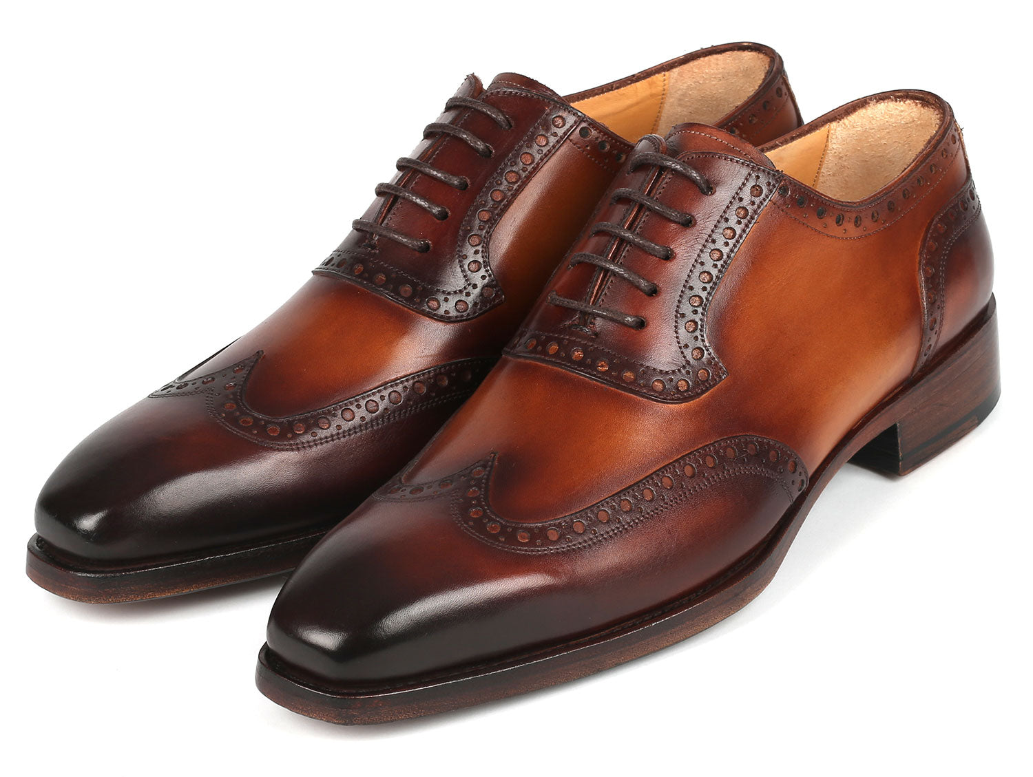 Paul Parkman Goodyear Welted Men's Wingtip Oxfords in brown leather, showcasing intricate craftsmanship and elegant design.