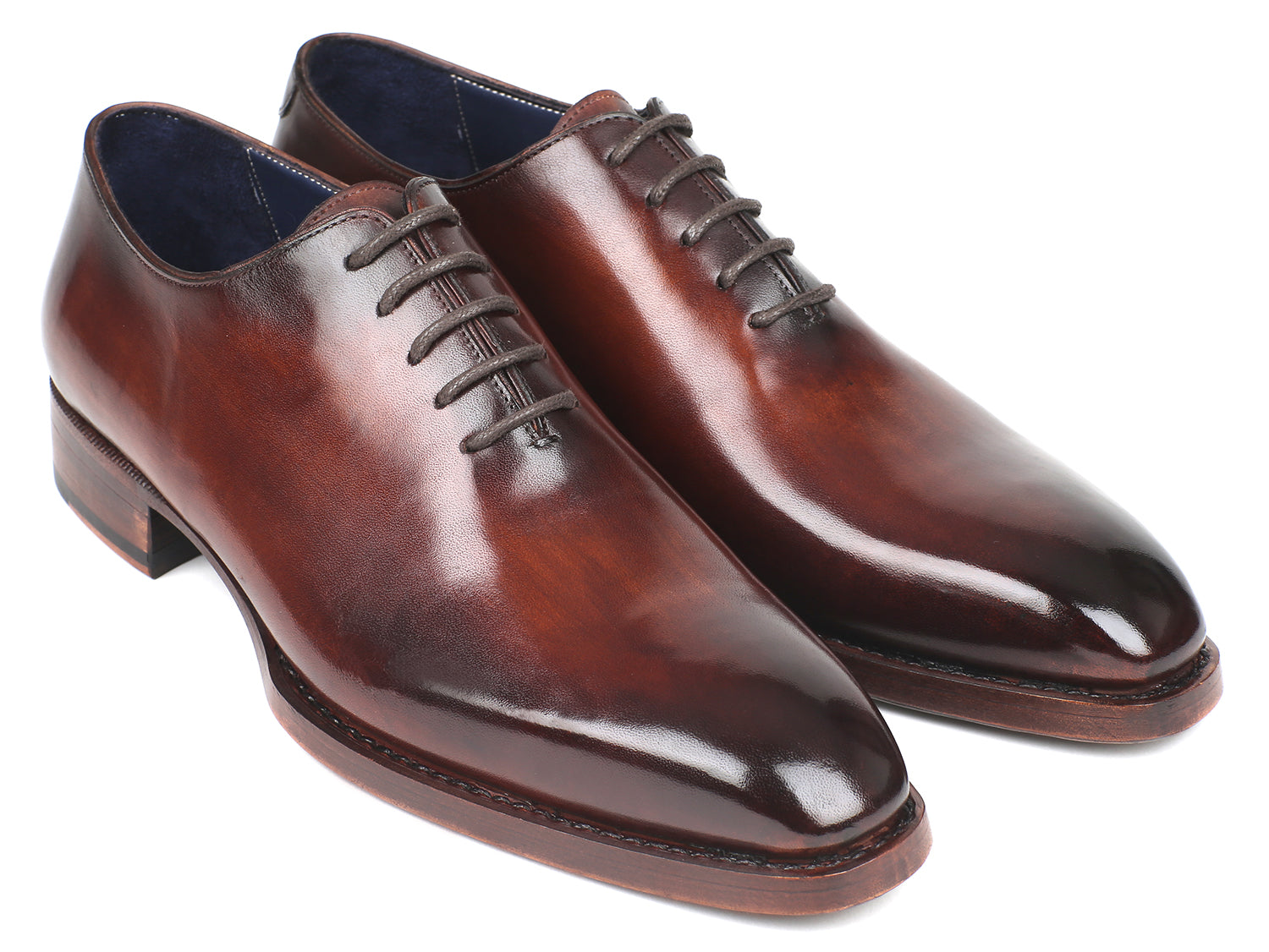 Paul Parkman Goodyear Welted Wholecut Oxfords in brown hand-painted leather with blue leather lining, showcasing elegant craftsmanship.