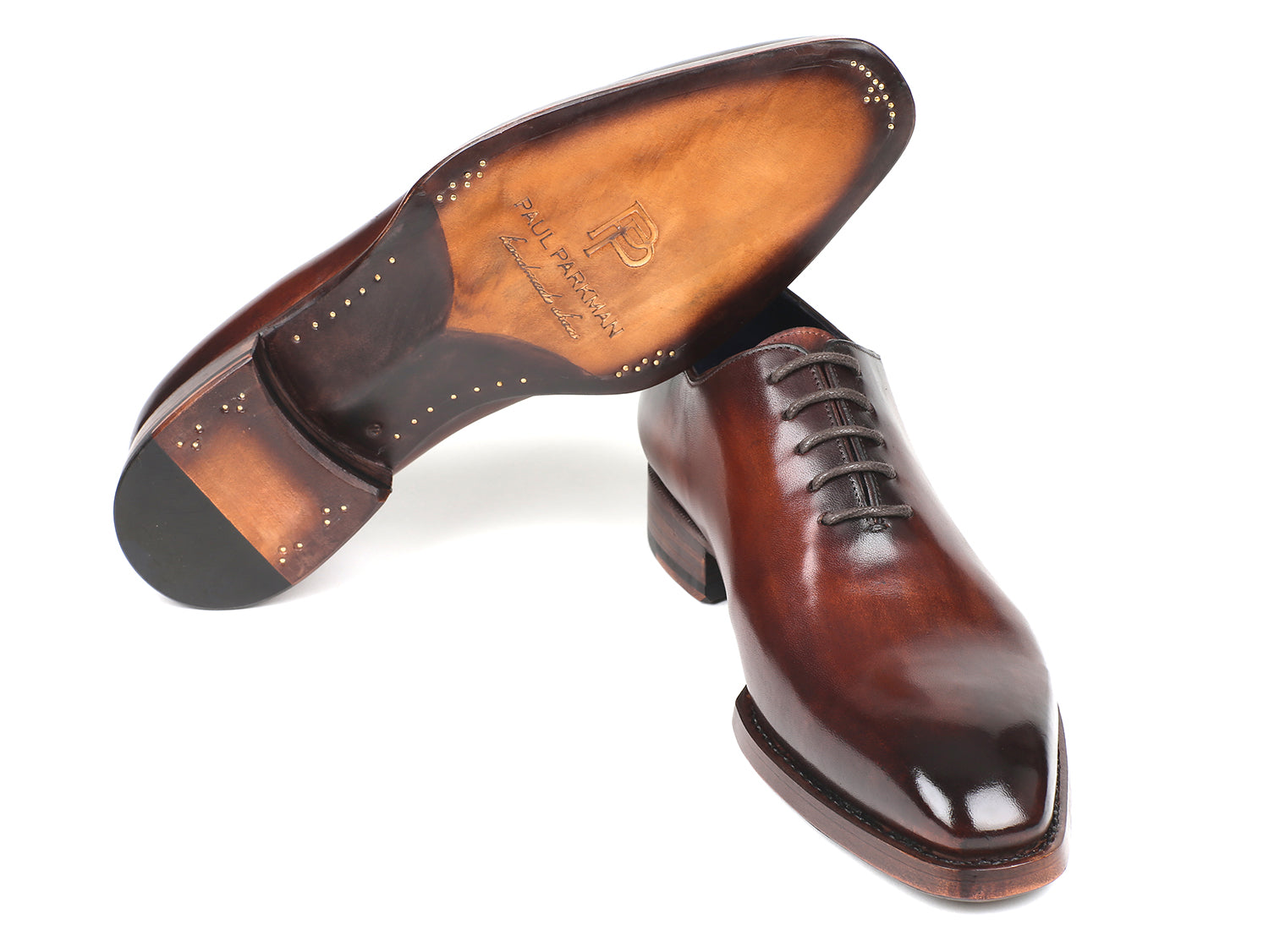 Paul Parkman Goodyear Welted Wholecut Oxfords in brown hand-painted leather with blue leather lining, showcasing elegant craftsmanship.