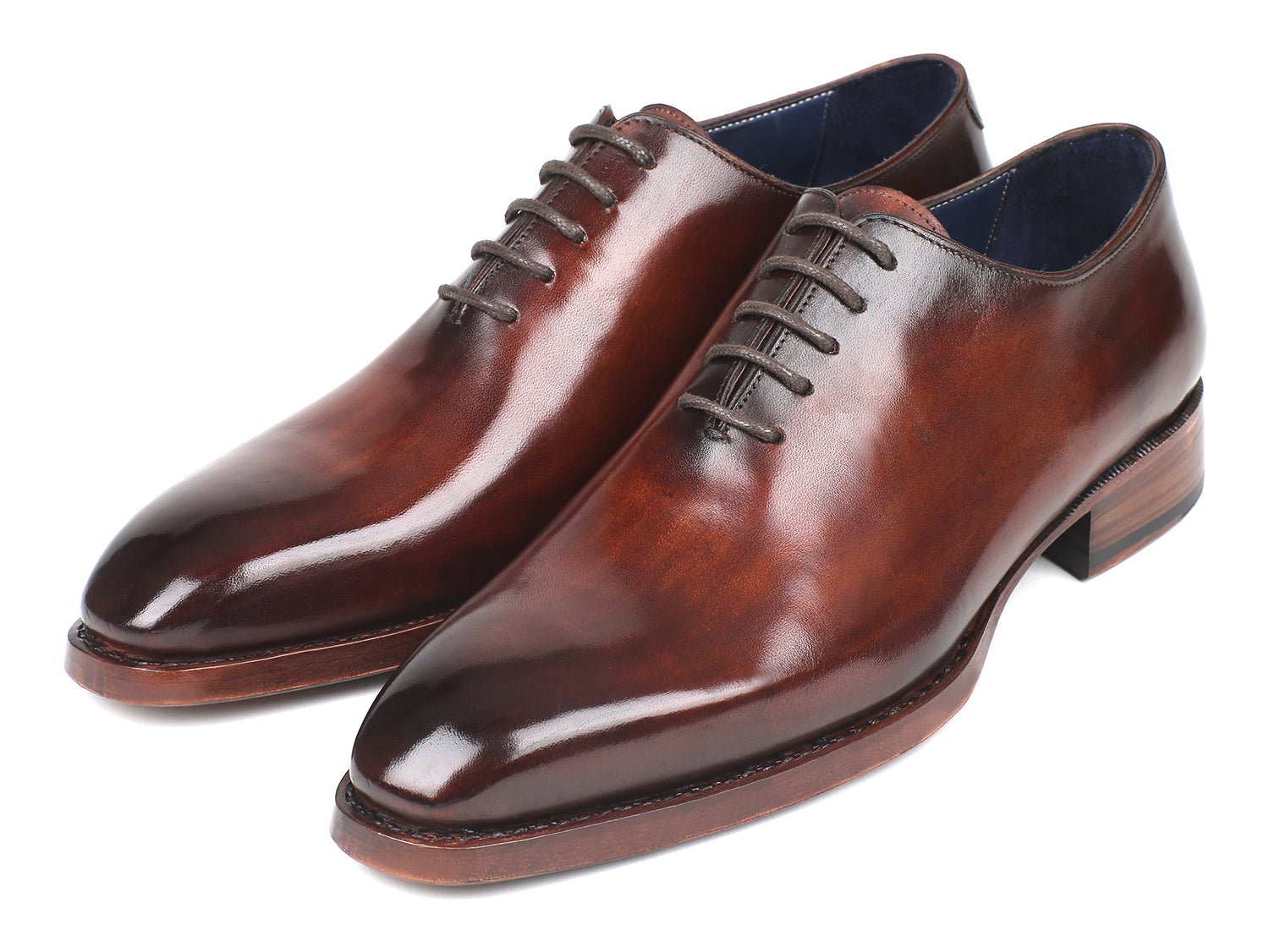 Paul Parkman Goodyear Welted Wholecut Oxfords in brown hand-painted leather with blue leather lining, showcasing elegant craftsmanship.