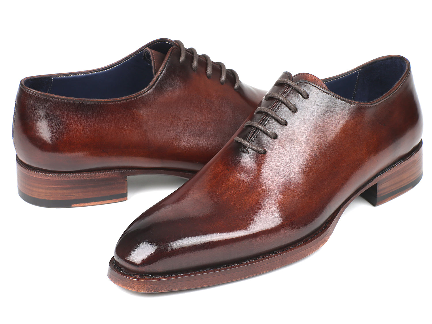 Paul Parkman Goodyear Welted Wholecut Oxfords in brown hand-painted leather with blue leather lining, showcasing elegant craftsmanship.