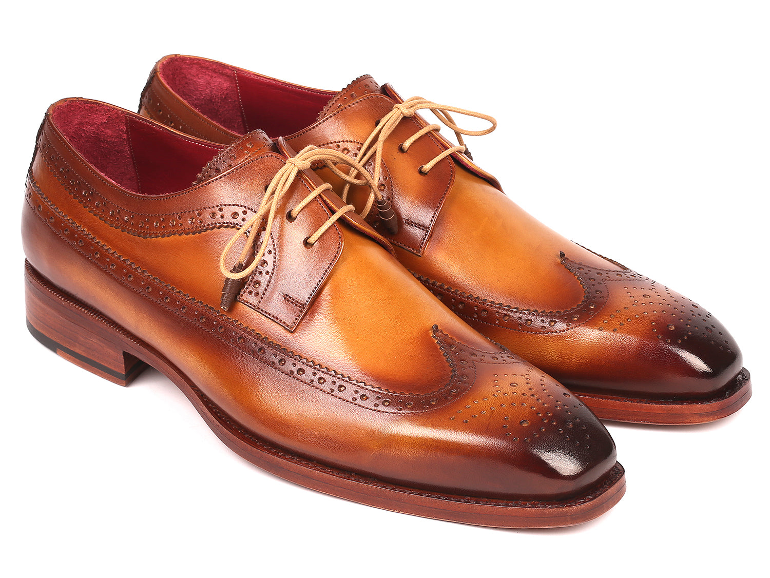 Paul Parkman Goodyear welted wingtip derby shoes in camel color, showcasing hand-painted calfskin leather and elegant wingtip design.