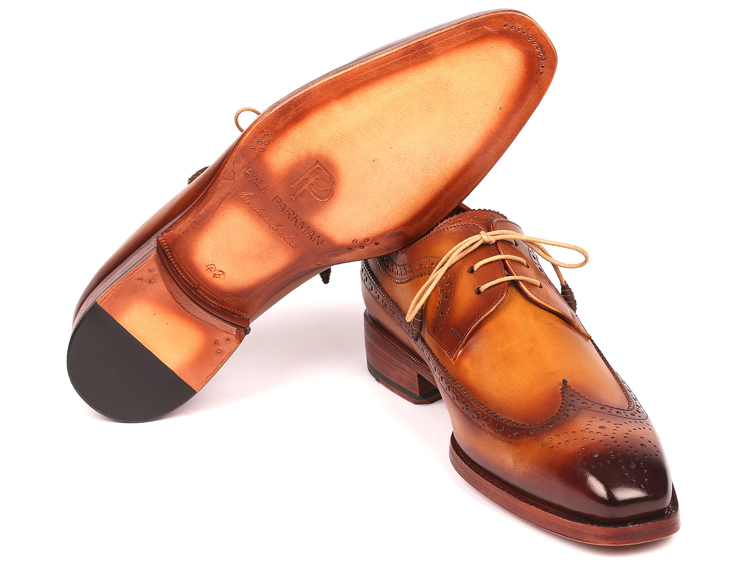 Paul Parkman Goodyear welted wingtip derby shoes in camel color, showcasing hand-painted calfskin leather and elegant wingtip design.