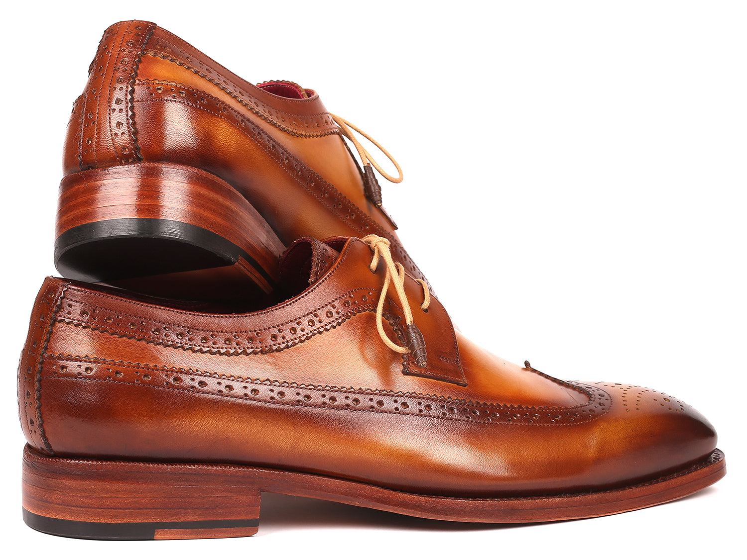 Paul Parkman Goodyear welted wingtip derby shoes in camel color, showcasing hand-painted calfskin leather and elegant wingtip design.