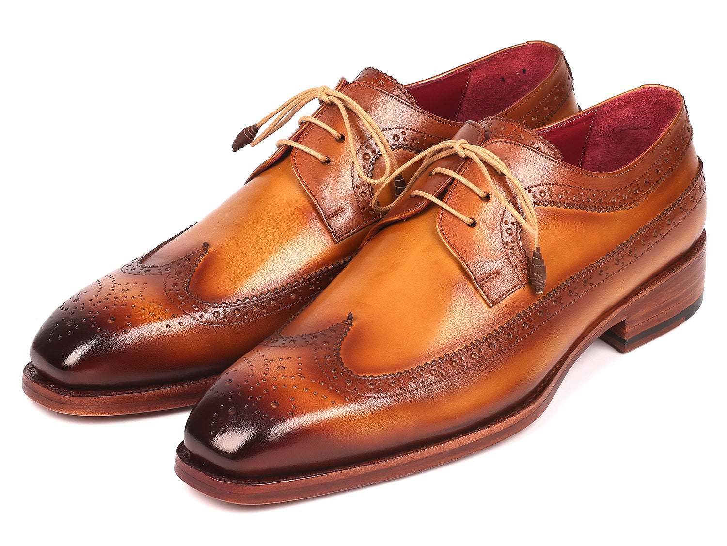 Paul Parkman Goodyear welted wingtip derby shoes in camel color, showcasing hand-painted calfskin leather and elegant wingtip design.