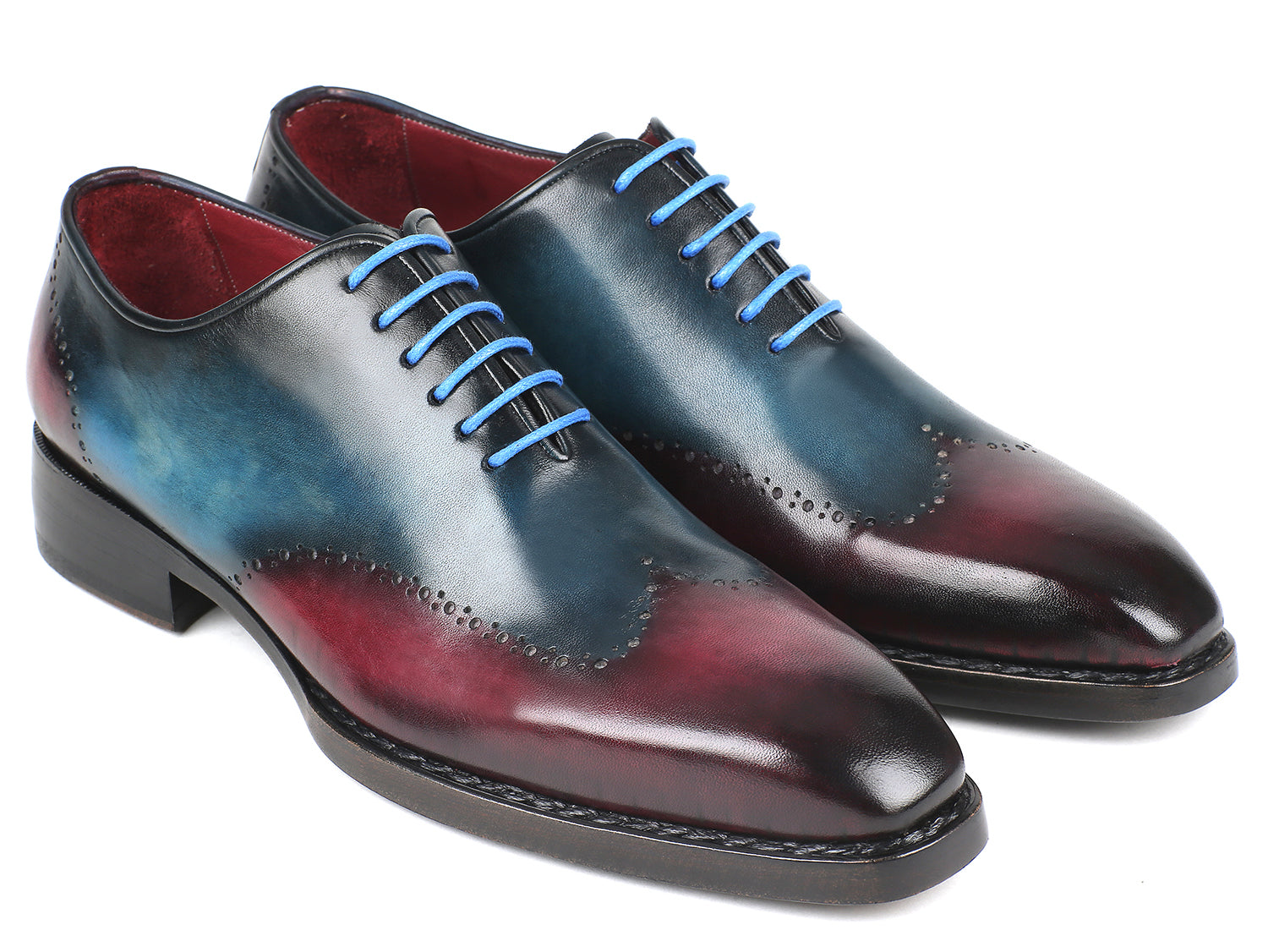 Paul Parkman Goodyear Welted Wingtip Oxfords in blue and purple, showcasing intricate brogue detailing and light blue laces.