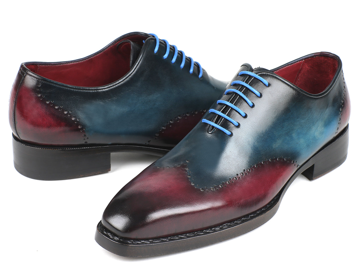 Paul Parkman Goodyear Welted Wingtip Oxfords in blue and purple, showcasing intricate brogue detailing and light blue laces.