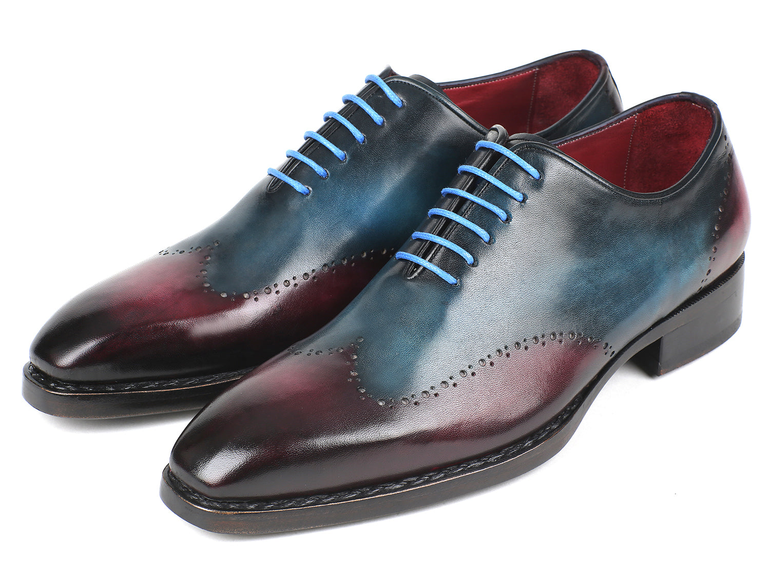 Paul Parkman Goodyear Welted Wingtip Oxfords in blue and purple, showcasing intricate brogue detailing and light blue laces.