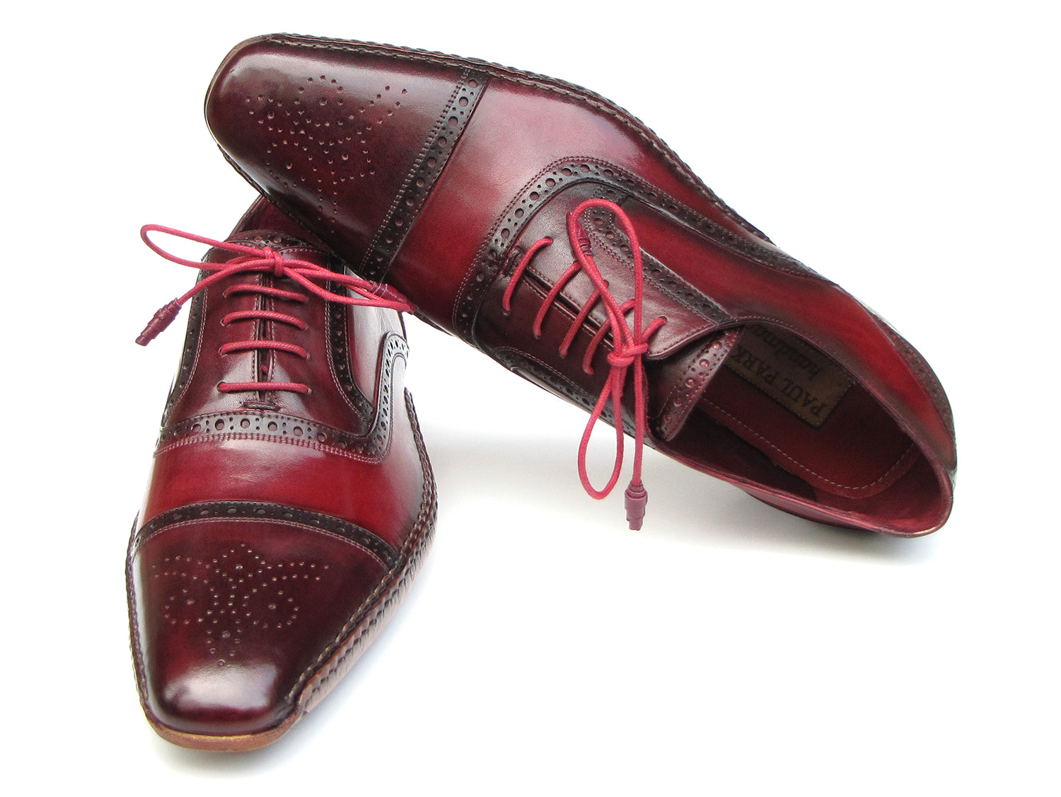 Paul Parkman Handsewn Captoe Oxfords in Red and Bordeaux with floral perforation and leather wrapped laces.