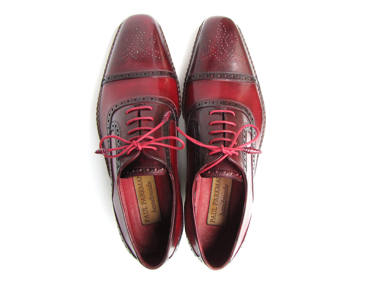 Paul Parkman Handsewn Captoe Oxfords in Red and Bordeaux with floral perforation and leather wrapped laces.