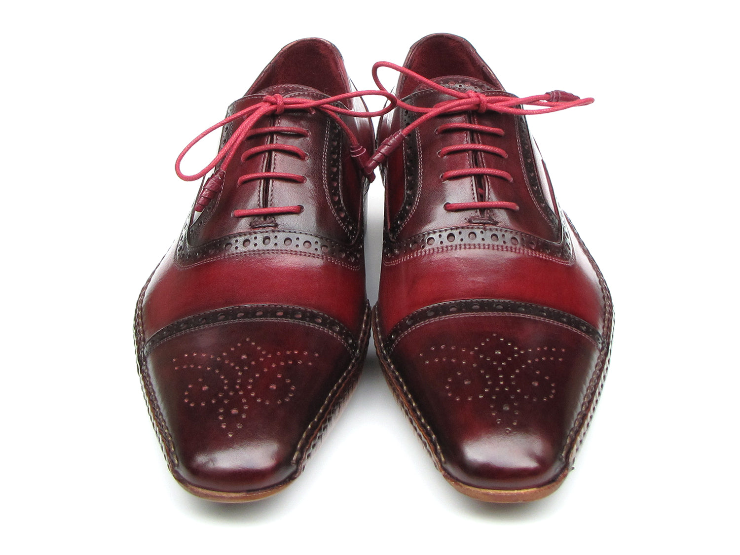 Paul Parkman Handsewn Captoe Oxfords in Red and Bordeaux with floral perforation and leather wrapped laces.