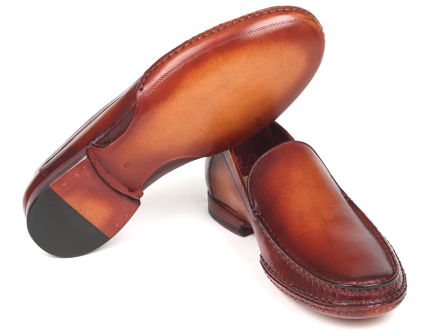 Paul Parkman Hand-Sewn Moccasins in Brown, showcasing hand-painted leather upper and opanka construction.