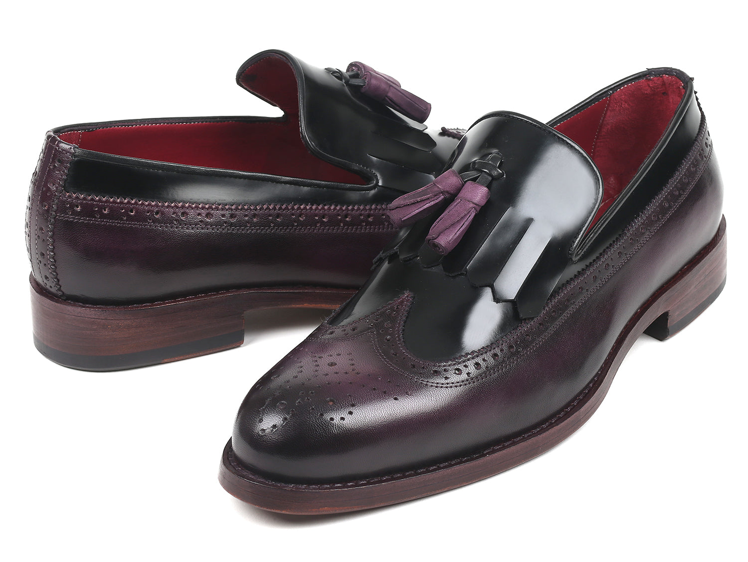 Paul Parkman Kiltie Tassel Loafer in Black and Purple, showcasing polished leather and intricate wingtip design.