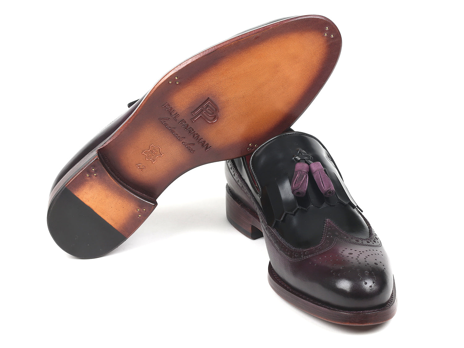 Paul Parkman Kiltie Tassel Loafer in Black and Purple, showcasing polished leather and intricate wingtip design.