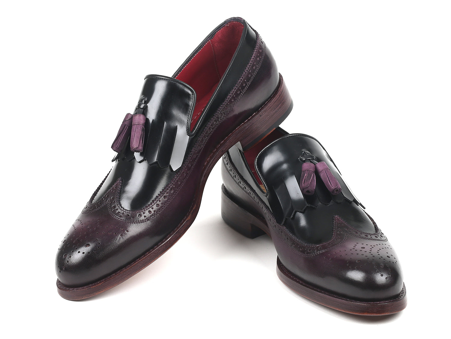 Paul Parkman Kiltie Tassel Loafer in Black and Purple, showcasing polished leather and intricate wingtip design.