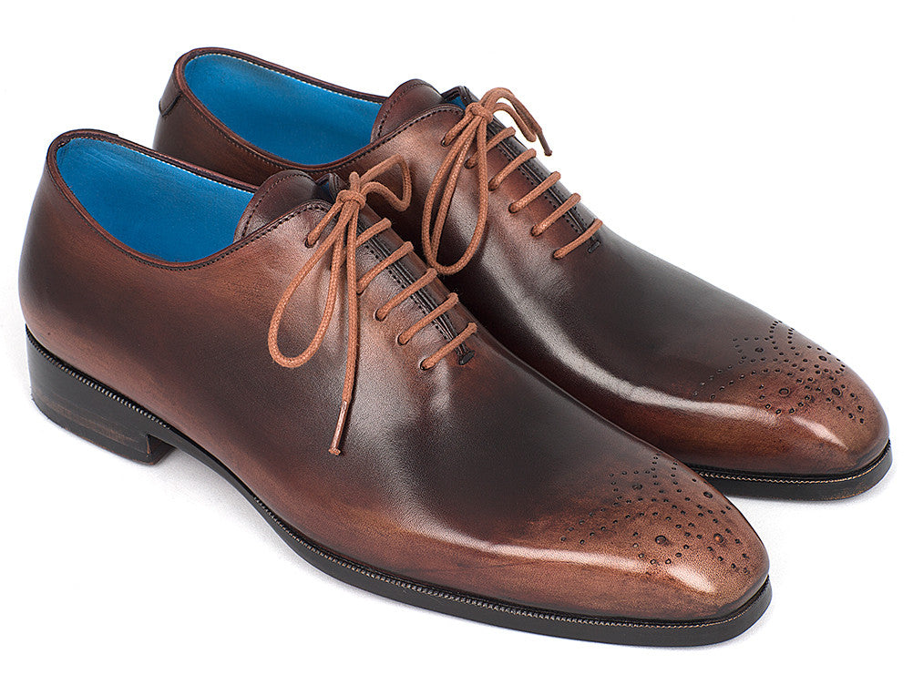 Paul Parkman Men's Camel & Brown Wholecut Oxfords showcasing a medallion toe design with hand-painted calfskin upper and antique finished leather sole.