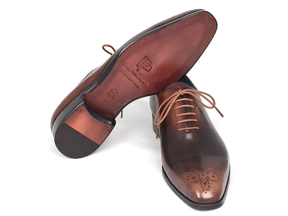 Paul Parkman Men's Camel & Brown Wholecut Oxfords showcasing a medallion toe design with hand-painted calfskin upper and antique finished leather sole.