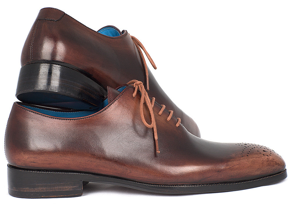 Paul Parkman Men's Camel & Brown Wholecut Oxfords showcasing a medallion toe design with hand-painted calfskin upper and antique finished leather sole.