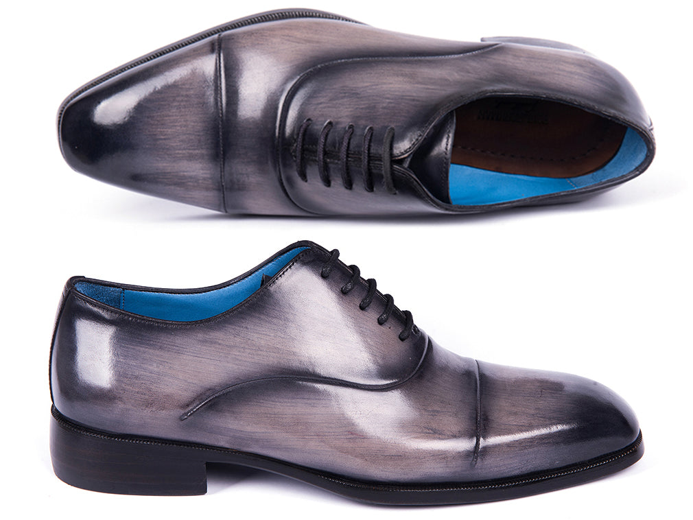 Paul Parkman Men's Cap Toe Oxfords in Gray Burnished, showcasing hand-painted leather upper and unique blue leather sole.