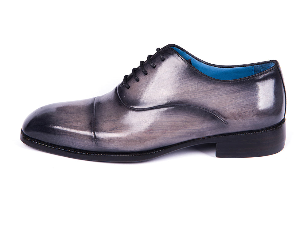 Paul Parkman Men's Cap Toe Oxfords in Gray Burnished, showcasing hand-painted leather upper and unique blue leather sole.