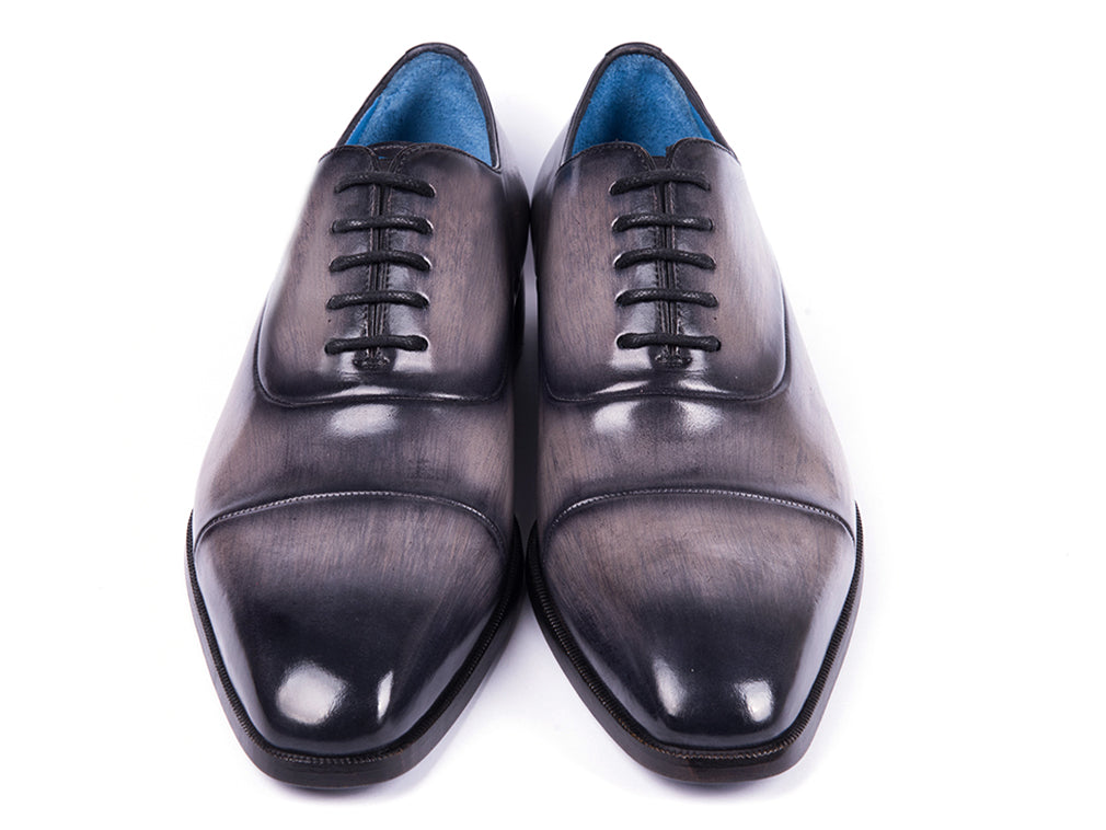 Paul Parkman Men's Cap Toe Oxfords in Gray Burnished, showcasing hand-painted leather upper and unique blue leather sole.