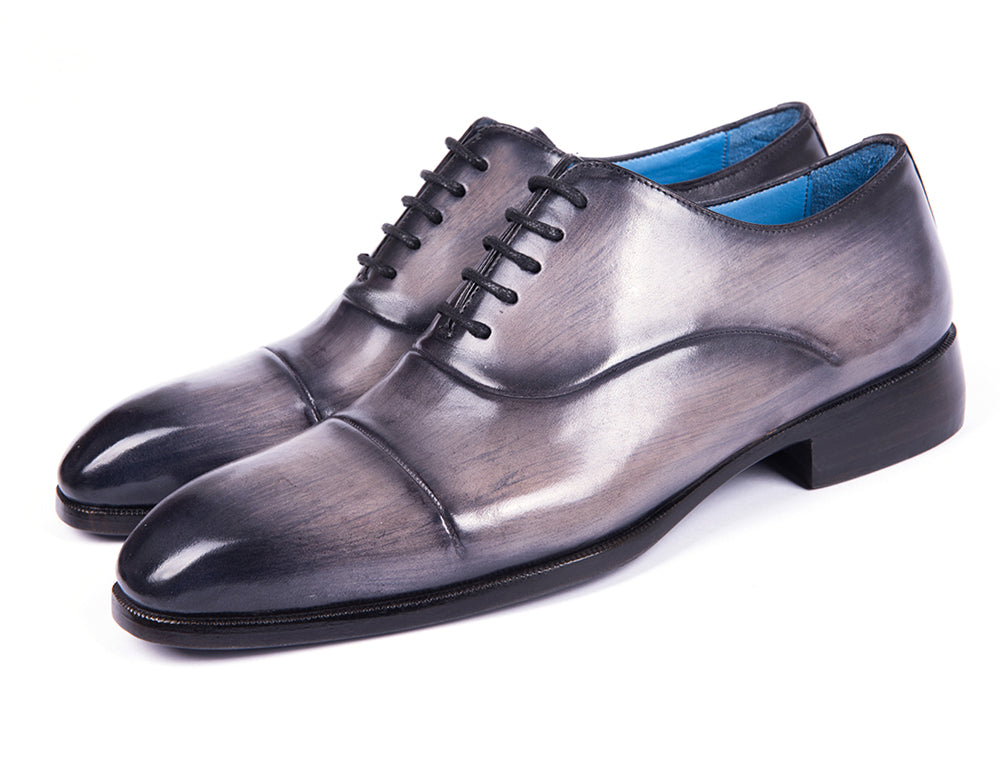 Paul Parkman Men's Cap Toe Oxfords in Gray Burnished, showcasing hand-painted leather upper and unique blue leather sole.