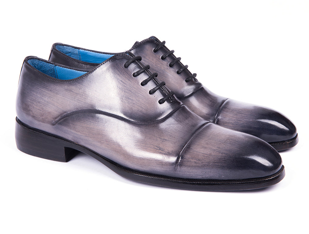 Paul Parkman Men's Cap Toe Oxfords in Gray Burnished, showcasing hand-painted leather upper and unique blue leather sole.