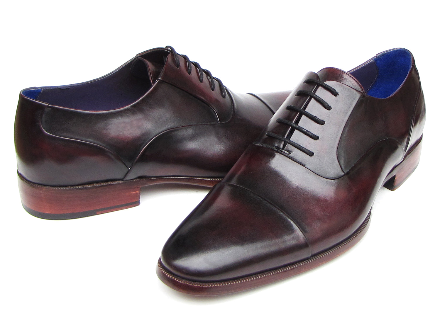 Paul Parkman Men's Captoe Oxfords in black and purple, showcasing hand-painted leather upper and bordeaux sole.