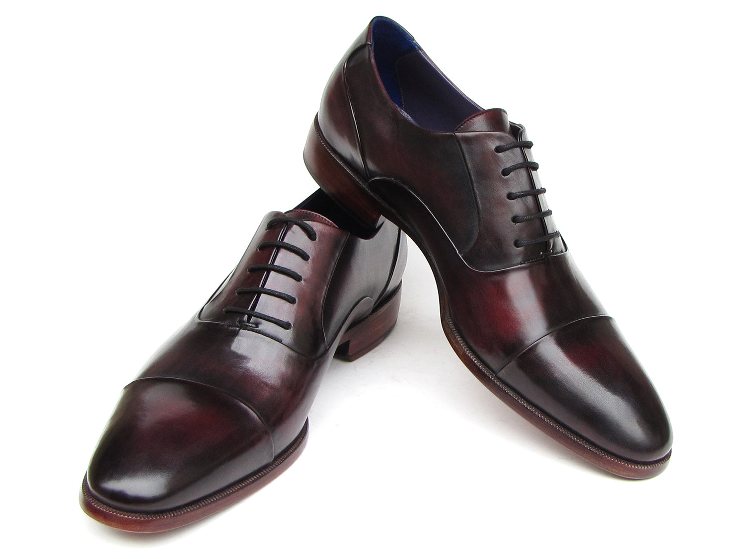 Paul Parkman Men's Captoe Oxfords in black and purple, showcasing hand-painted leather upper and bordeaux sole.