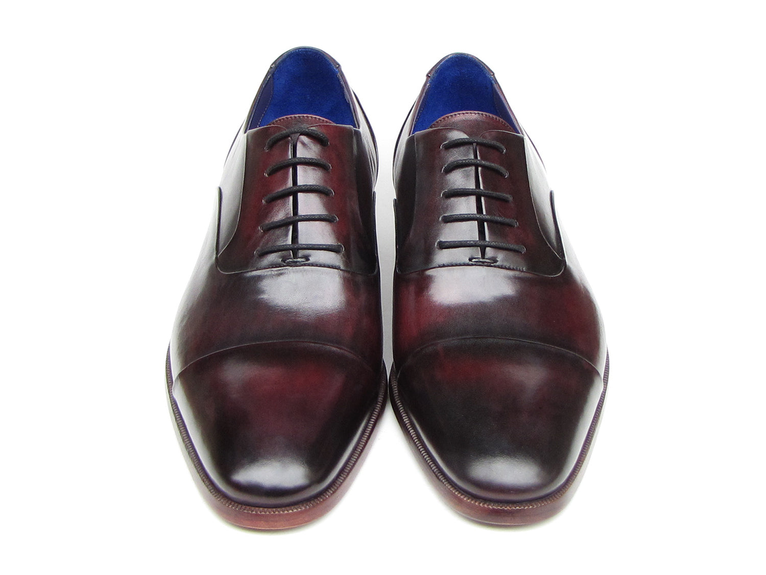 Paul Parkman Men's Captoe Oxfords in black and purple, showcasing hand-painted leather upper and bordeaux sole.