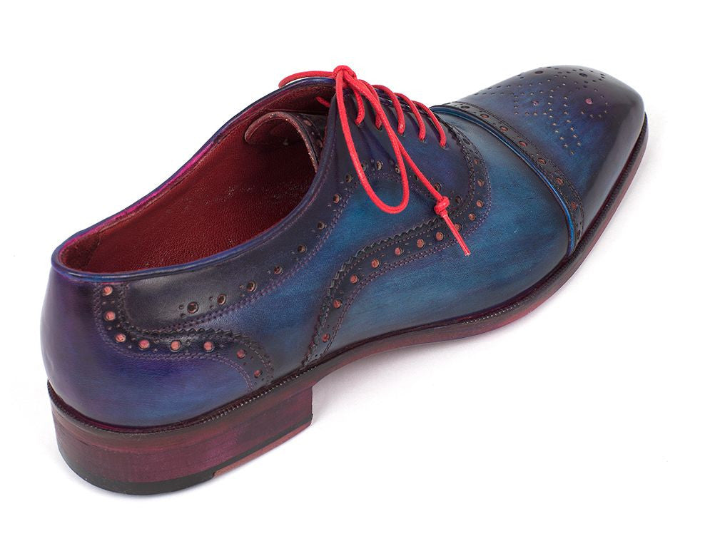 Paul Parkman Men's Captoe Oxfords in Blue & Parliament with hand-painted leather upper and purple leather sole, showcasing elegant design and craftsmanship.