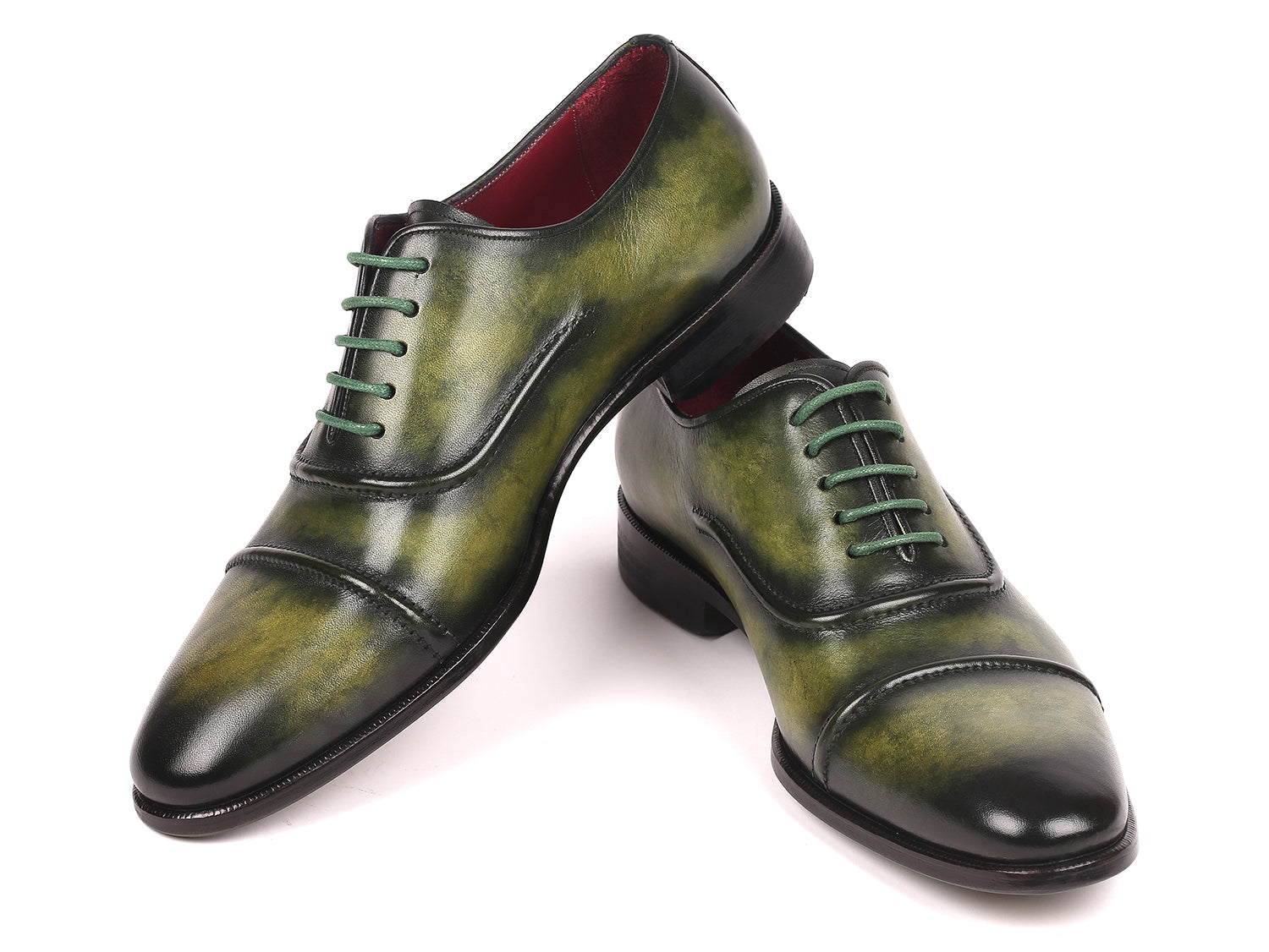 Paul Parkman Men's Cap-Toe Oxfords in green, showcasing hand-painted leather upper and antique finished sole.