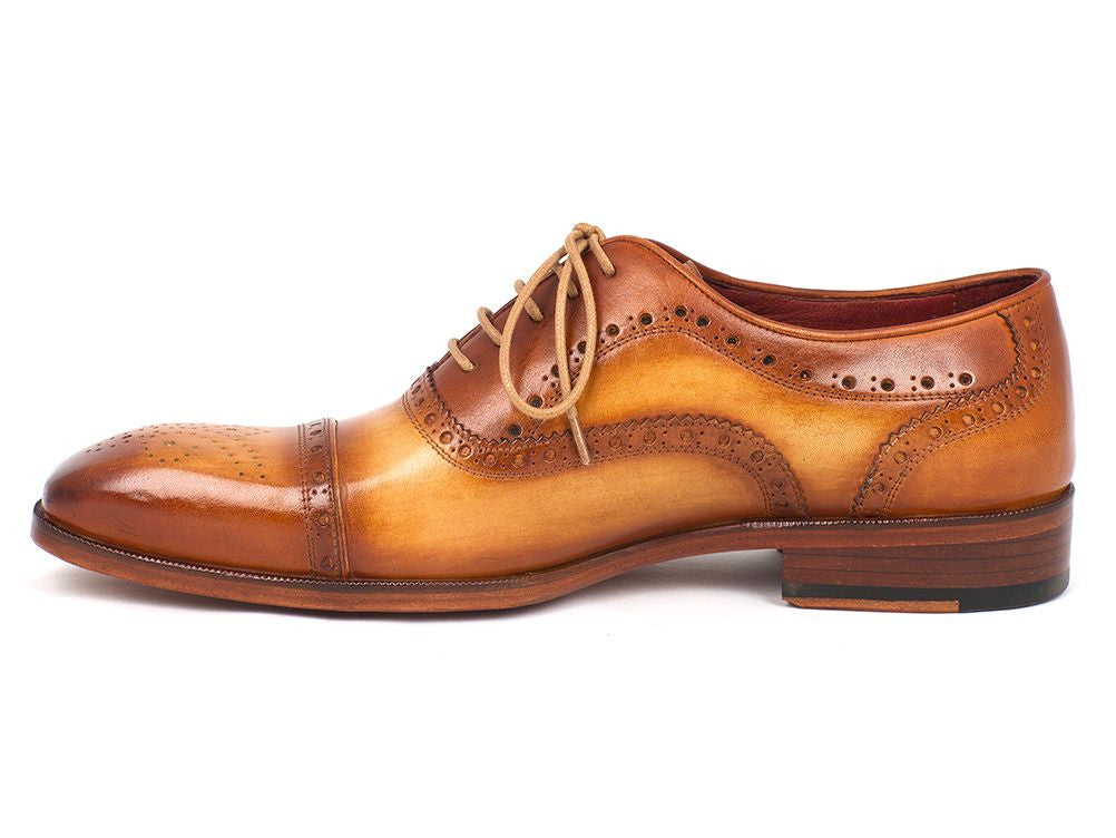 Paul Parkman Men's Captoe Oxfords in tan color, featuring hand-painted leather upper, perforated cap-toe design, and natural antiqued leather sole.