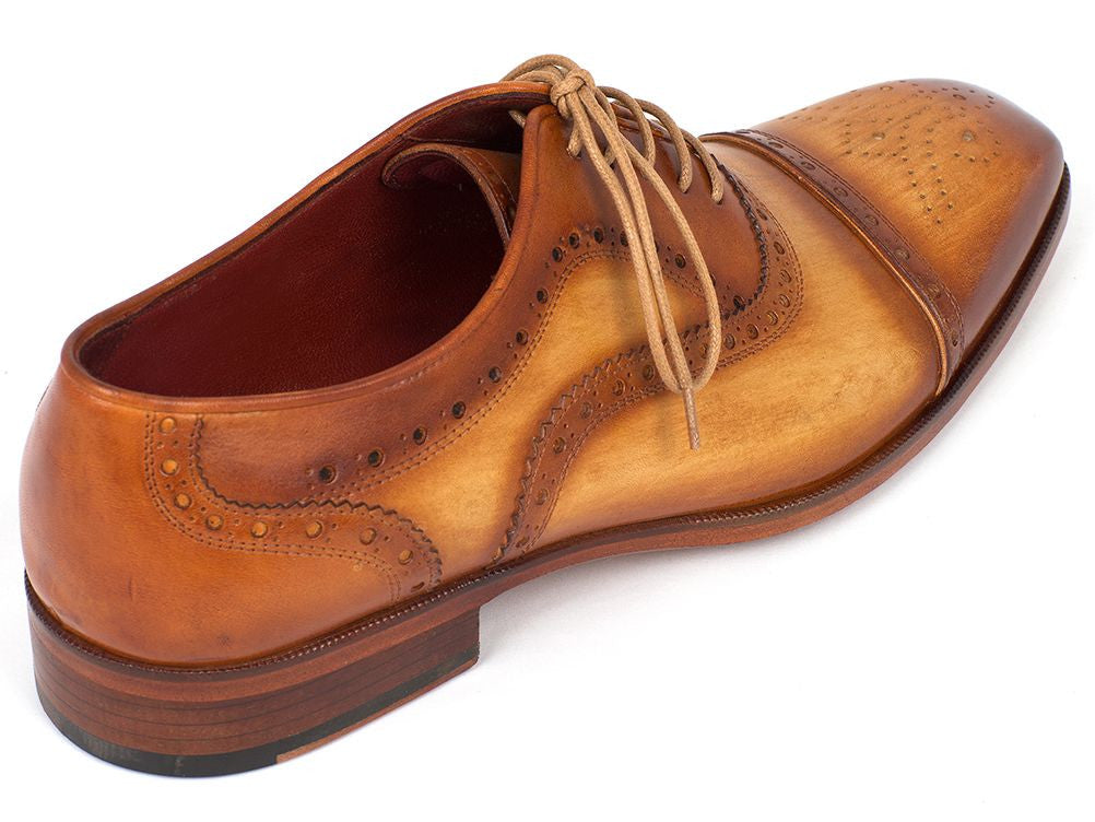 Paul Parkman Men's Captoe Oxfords in tan color, featuring hand-painted leather upper, perforated cap-toe design, and natural antiqued leather sole.