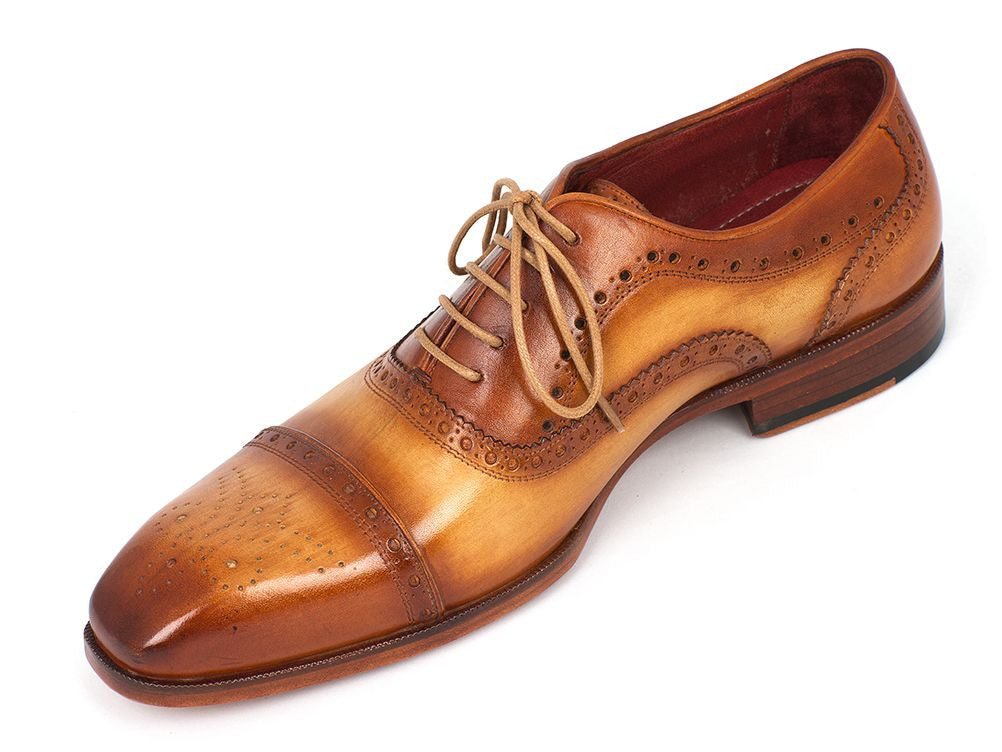 Paul Parkman Men's Captoe Oxfords in tan color, featuring hand-painted leather upper, perforated cap-toe design, and natural antiqued leather sole.