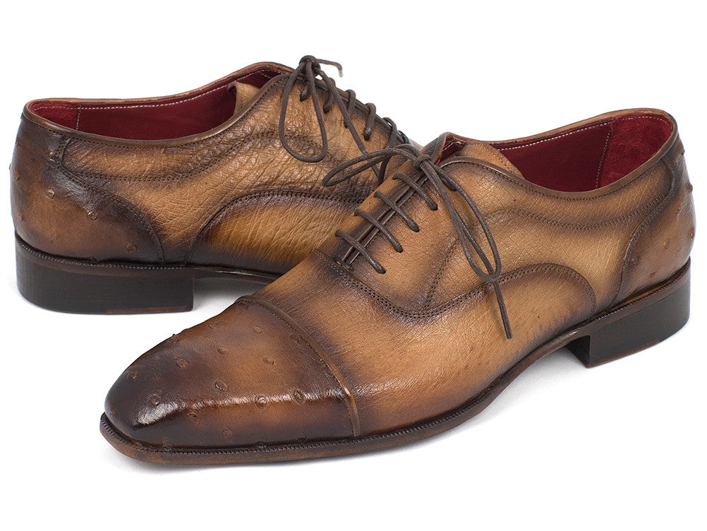 Paul Parkman Men's Genuine Ostrich Captoe Oxfords in camel color with intricate detailing and luxurious finish.