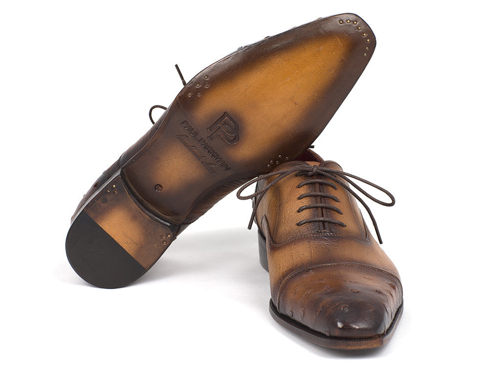 Paul Parkman Men's Genuine Ostrich Captoe Oxfords in camel color with intricate detailing and luxurious finish.