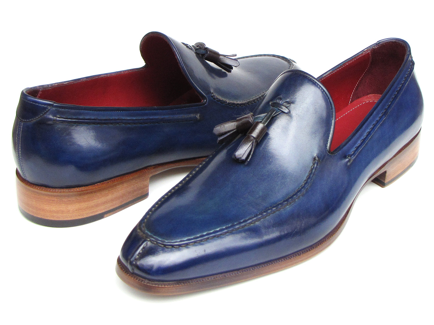 Paul Parkman Men's Tassel Loafer in blue hand-painted leather with red lining, showcasing elegant tassel detail.