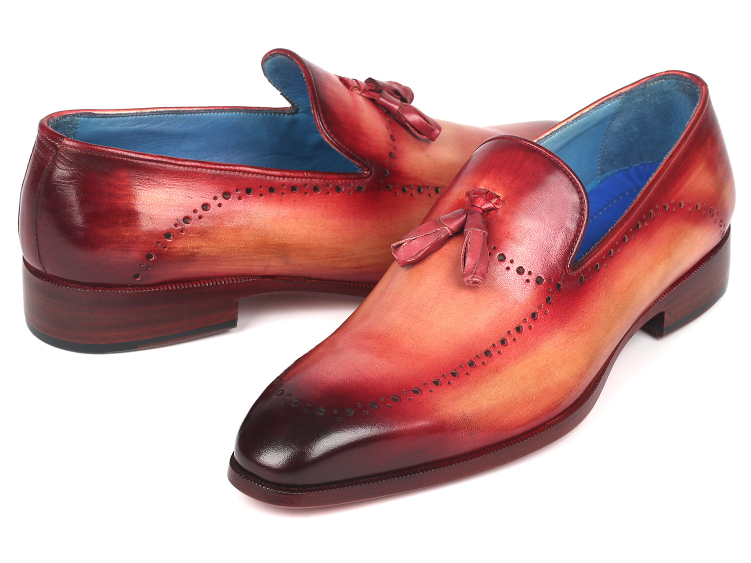 Paul Parkman Men's Burgundy Tassel Loafer showcasing hand-painted leather with perforated design and blue leather lining.