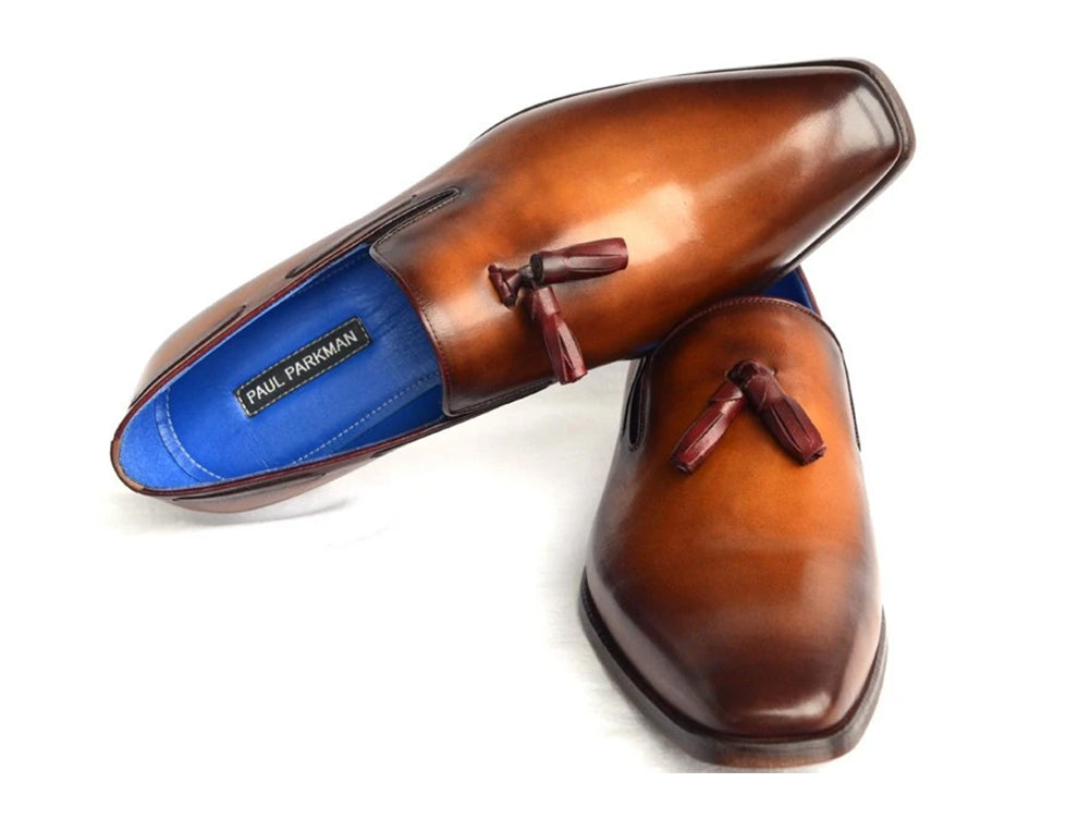 Paul Parkman Men's Tassel Loafer in walnut leather with blue lining and antiqued leather sole, showcasing elegant craftsmanship.