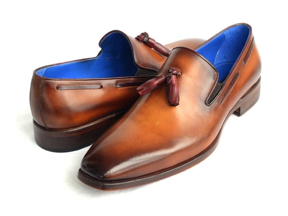 Paul Parkman Men's Tassel Loafer in walnut leather with blue lining and antiqued leather sole, showcasing elegant craftsmanship.