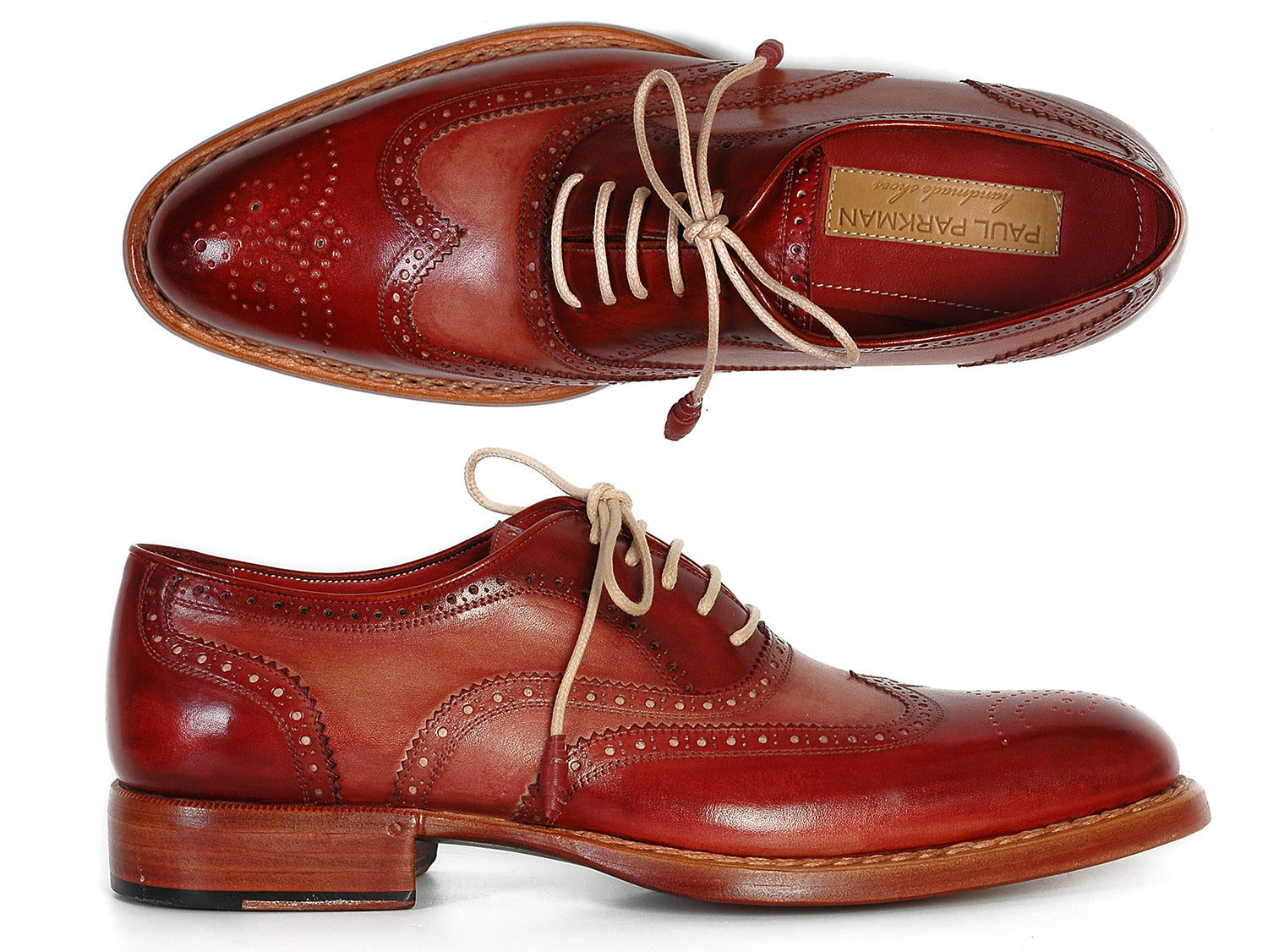 Paul Parkman Men's Wingtip Oxfords in Bordeaux and Camel, showcasing hand-painted leather upper and elegant design.